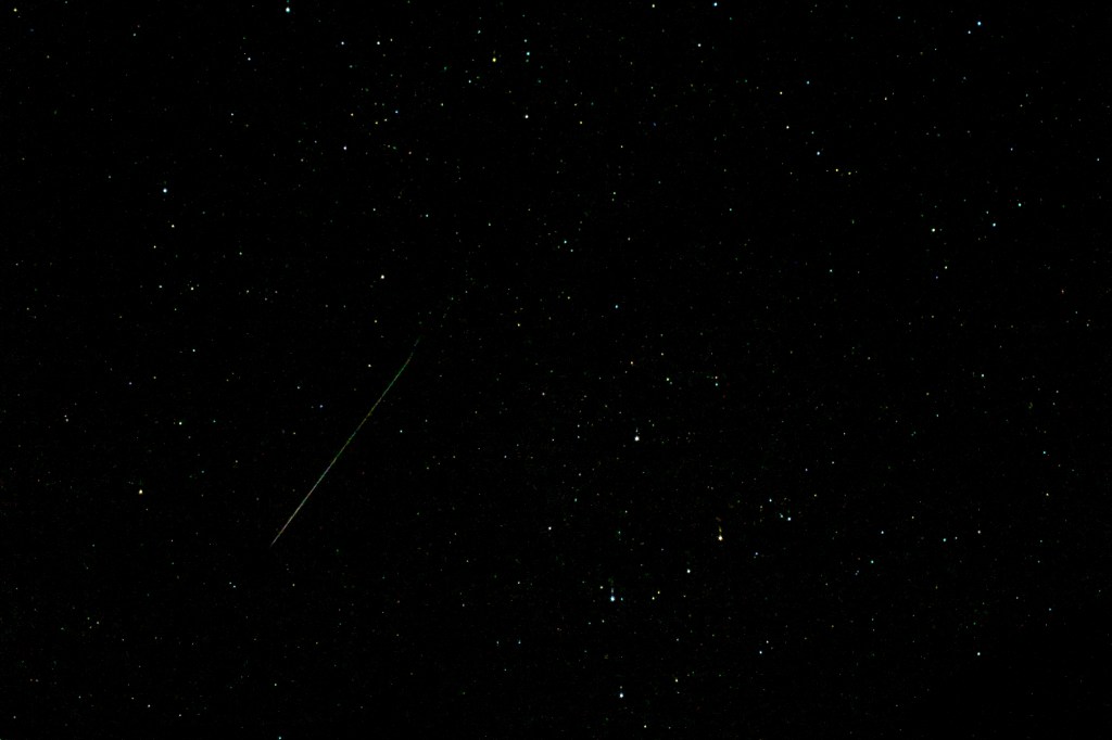 A moving satellite in the starry sky